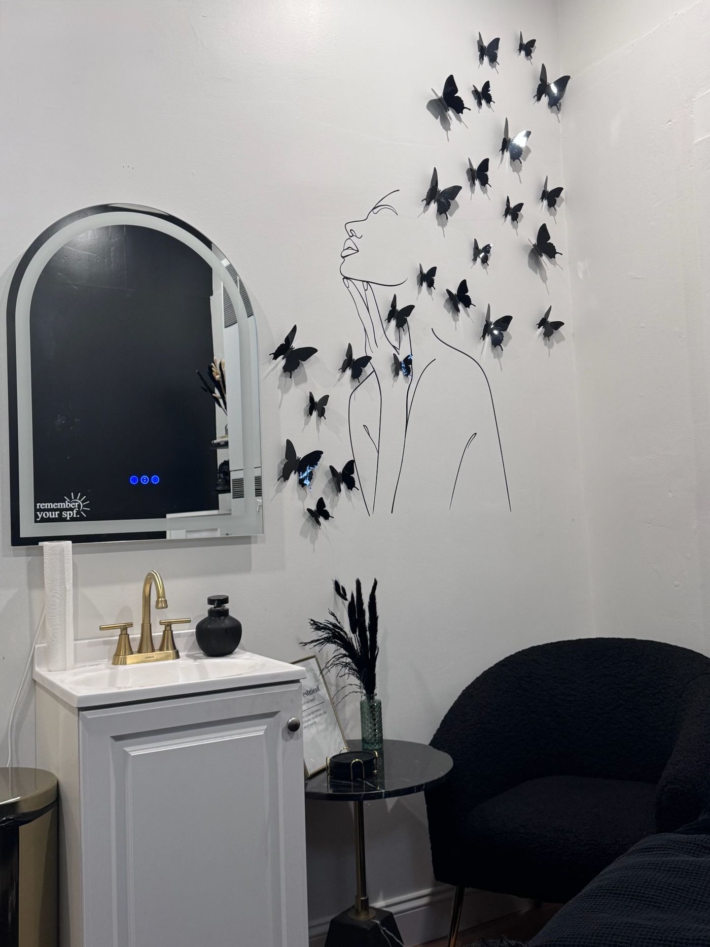 The studio — arched mirror and butterfly wall